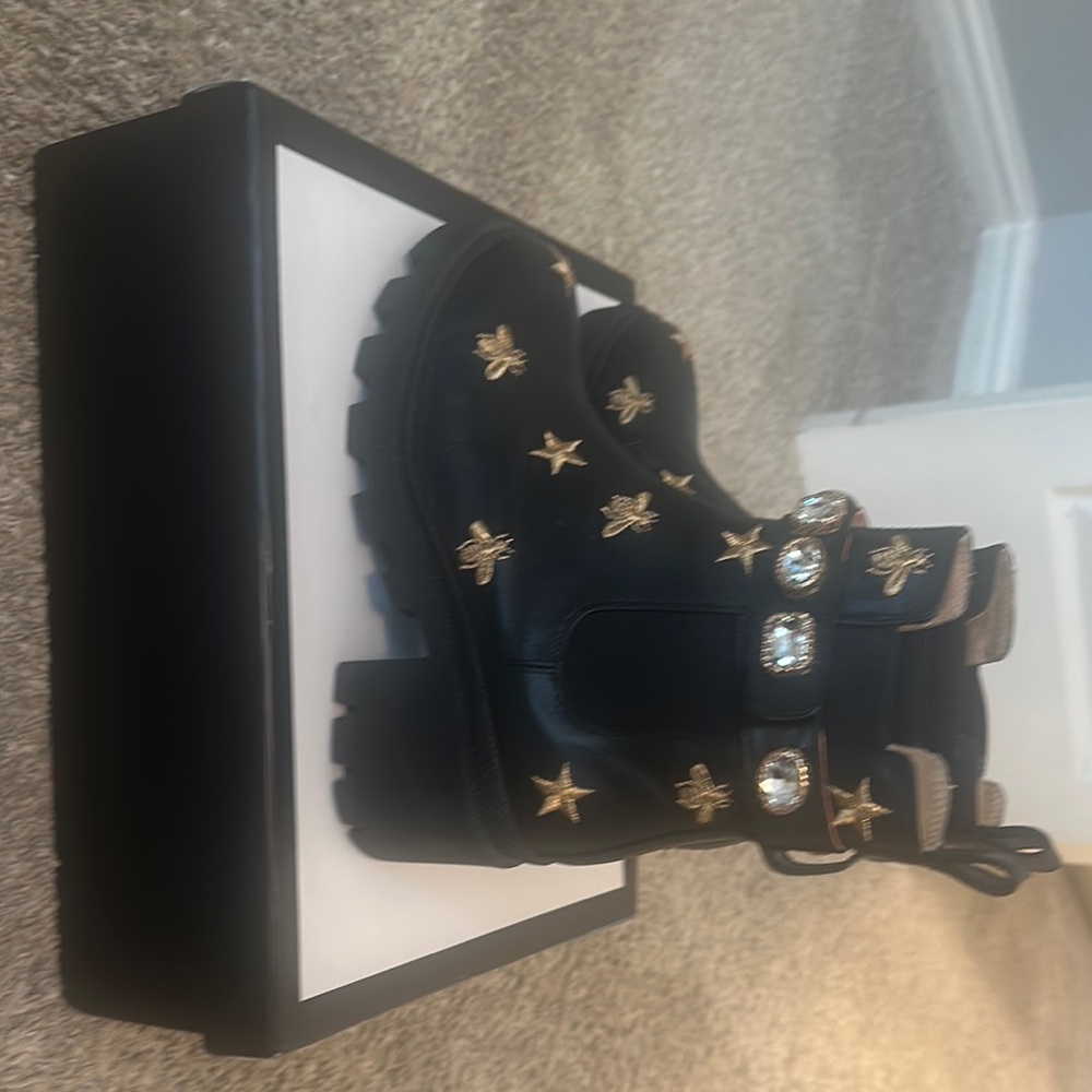 Gucci Black and Gold Ankle Boots with Star Embellishments